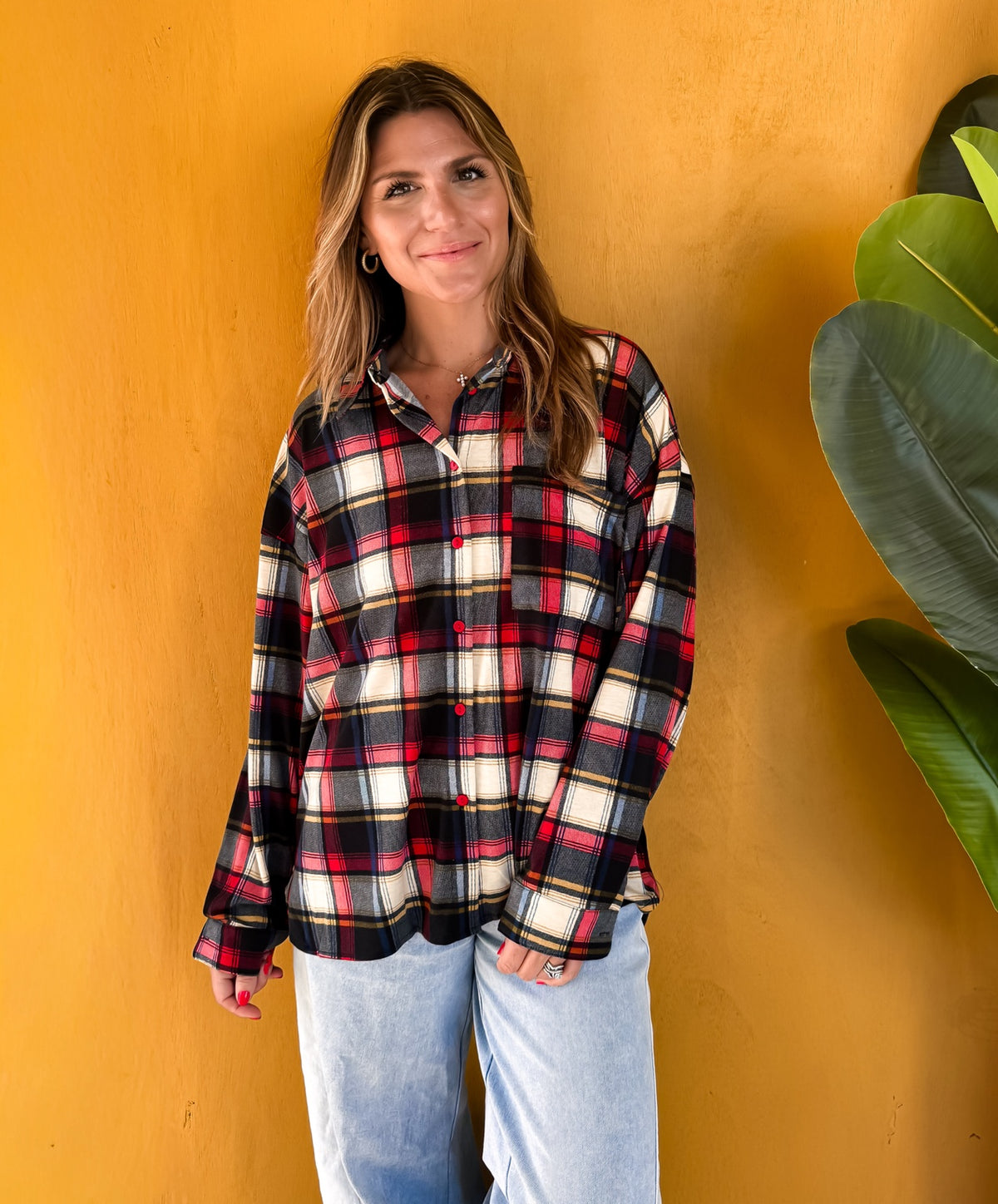 Front view of the relaxed Plaid to Meet You Shirt in navy, red, cream, and yellow.